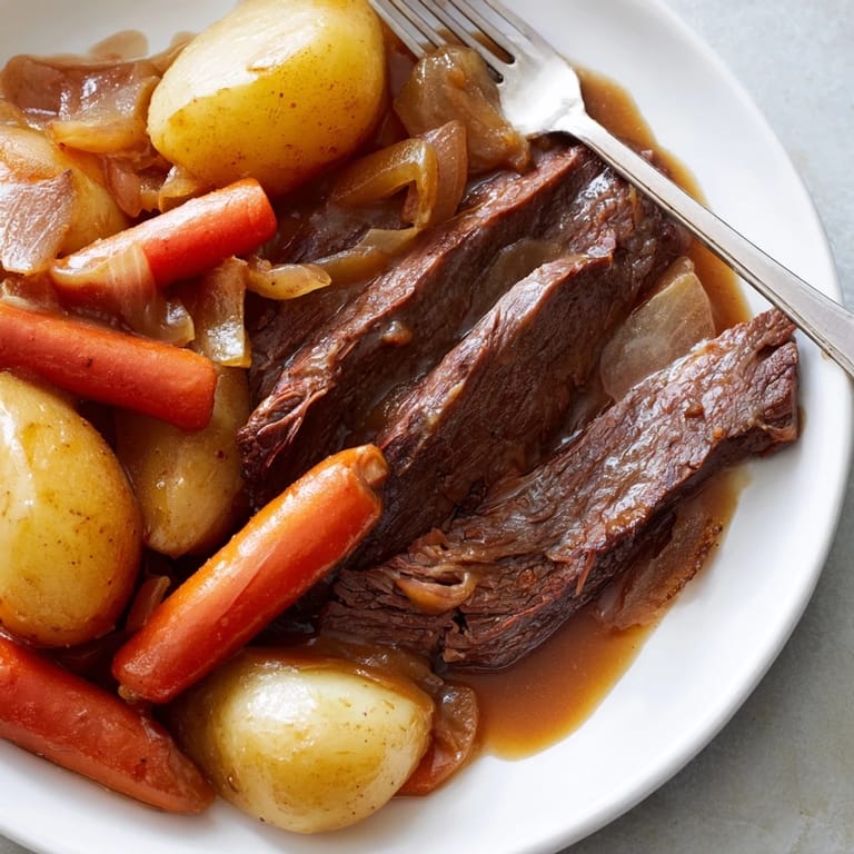 Steam rises from a flavorful beef pot roast with hearty vegetables, ready for a family feast.